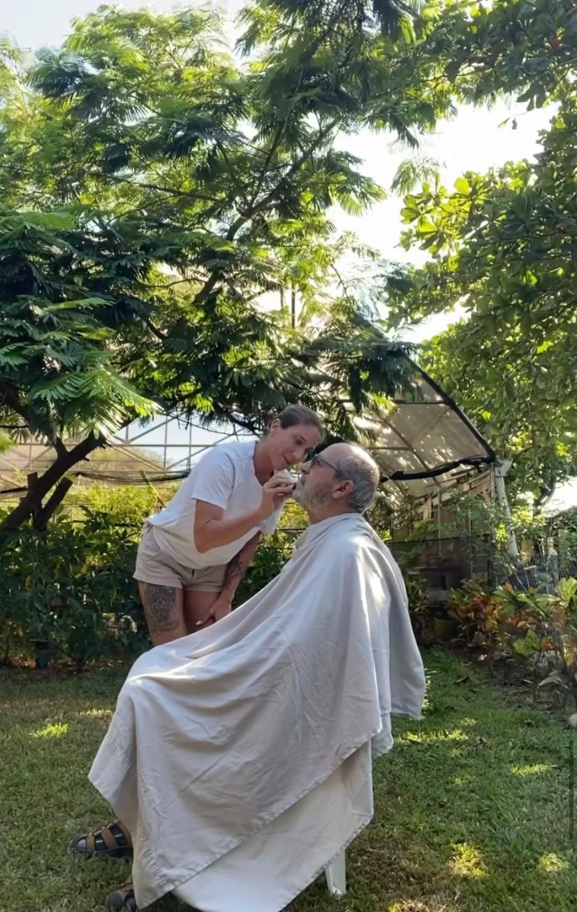 Felicia sharing an unhurried moment with a client in the garden